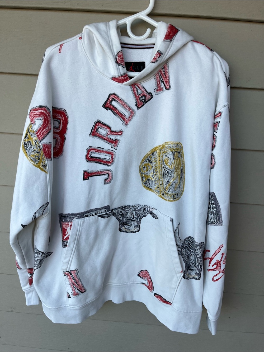 Jordan White Pullover Hoodie with Red and Gold Graphic Accents